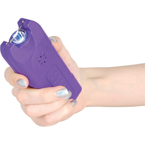 Purple Multiguard stun gun in hand