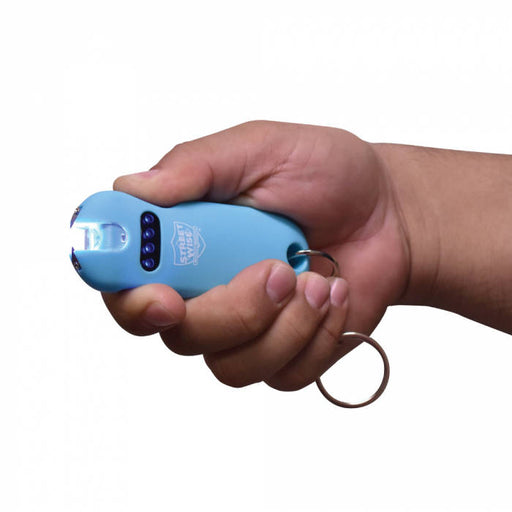 Hand holding Smart Stun Gun