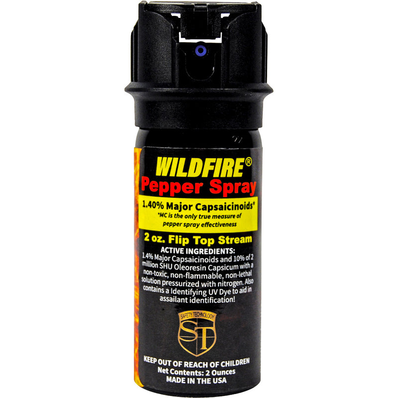 Wildfire 2oz flip-top pepper spray canister showing flip-top actuator for single-hand access
