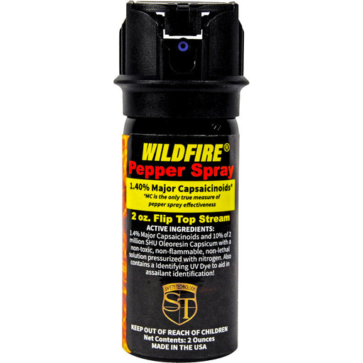 Wildfire 2oz flip-top pepper spray canister showing flip-top actuator for single-hand access