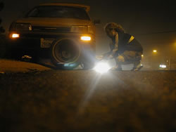 Changing a Tire at Night