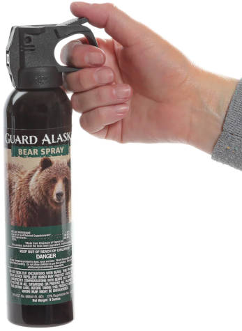 Bear Spray Held in Hand