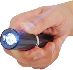 Lipstick Stun Gun with Flashlight held in hand