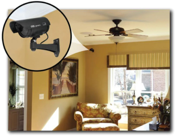 Realistic dummy security camera mounted on wall